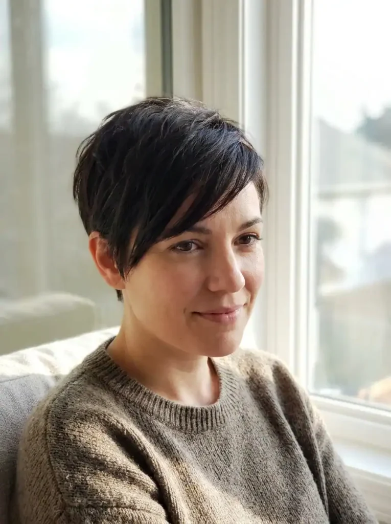 Feminine pixie cut with deep side part