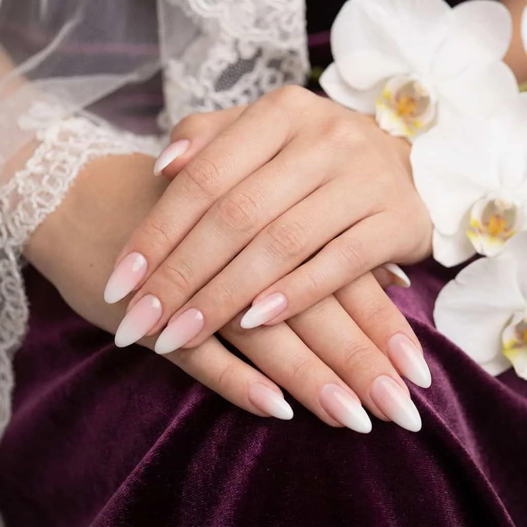 Flawless crisp white ombre fade neutral nail design.