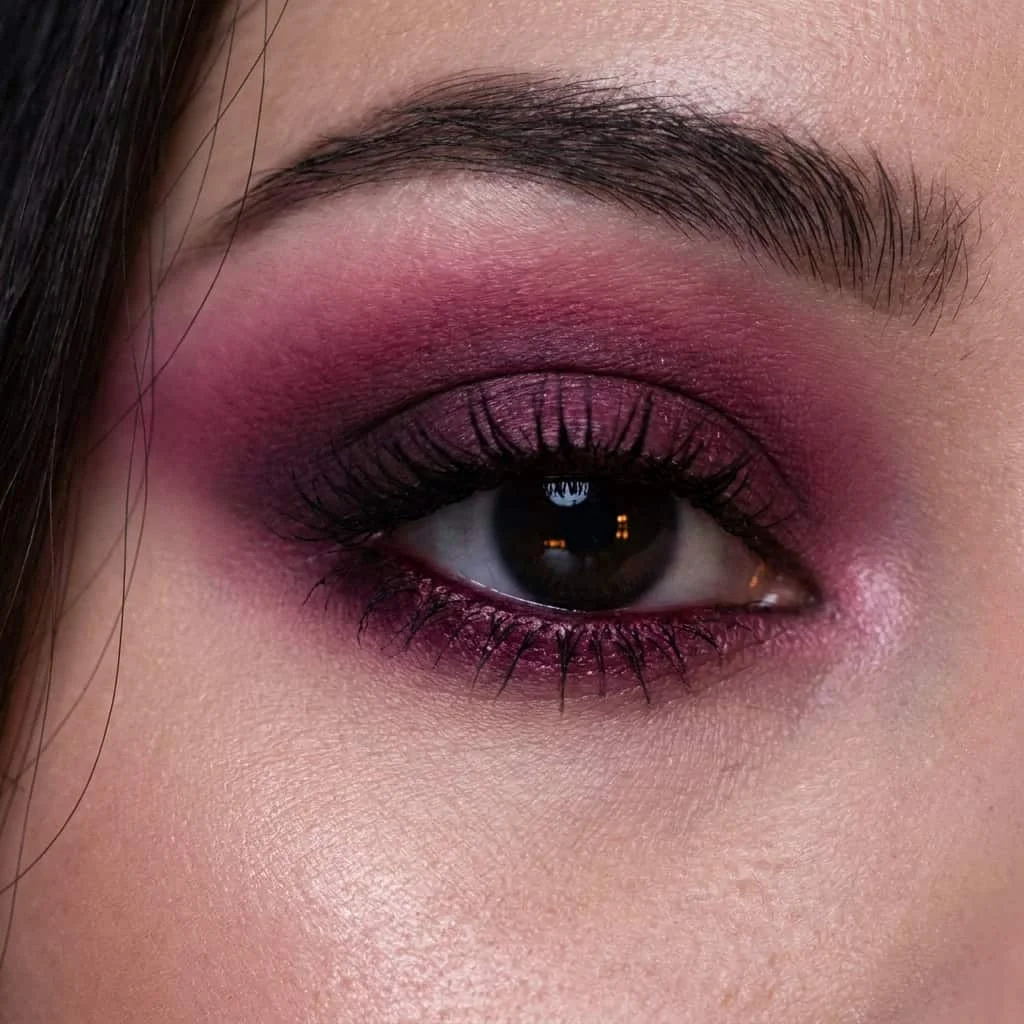 Blown out smokey eye using rich magenta and plum